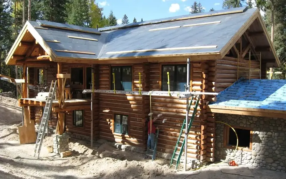 Frontier Log Homes Hand-peeled full round log cabin kits